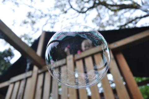 Photograph of John McFarlane, his son, Owain and his bubble